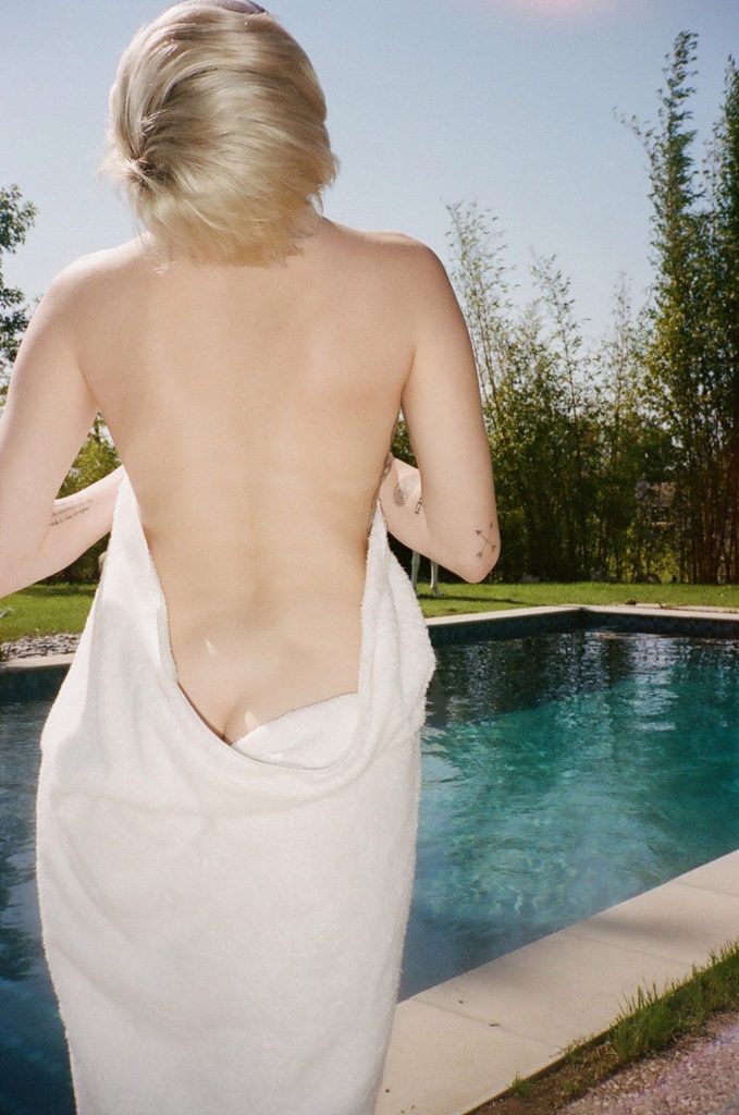 Miley Cyrus naked at the pool