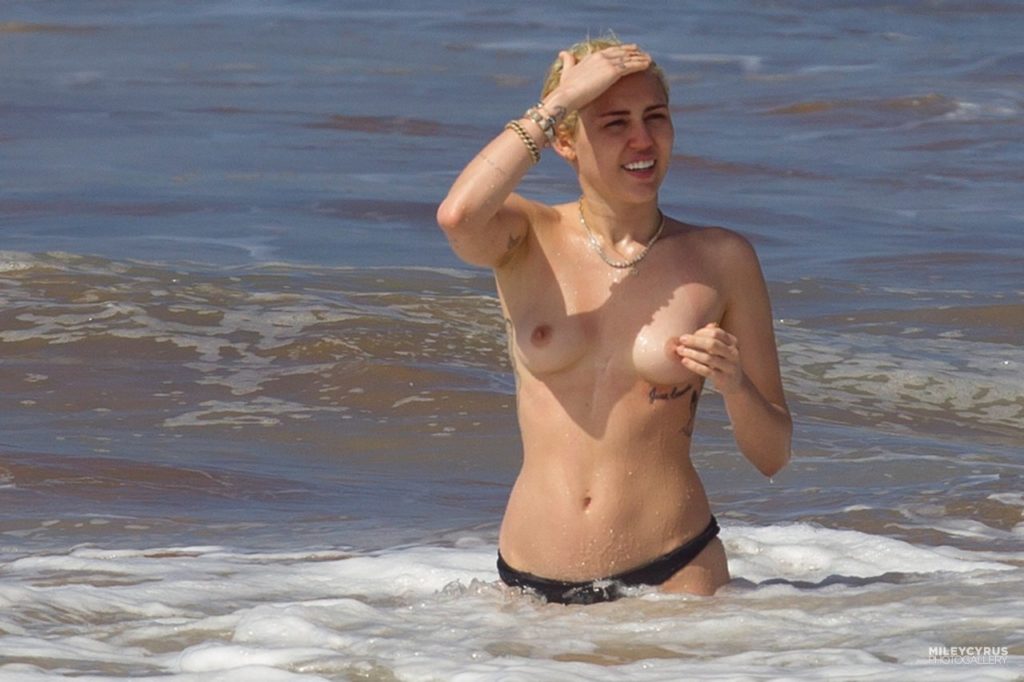 Miley Cyrus nude on the beach